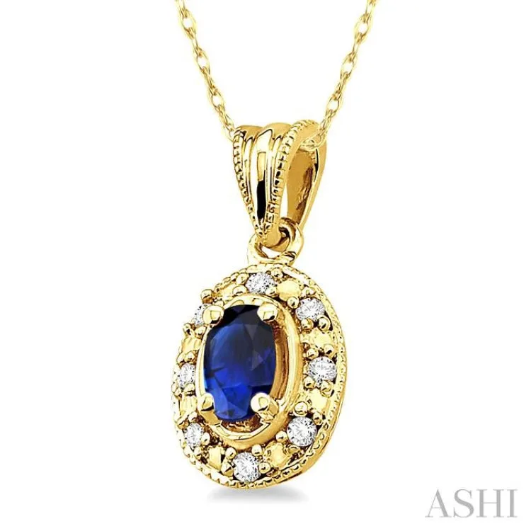 5x3mm Oval Shape Sapphire and 1/20 Ctw Single Cut Diamond Pendant in 10K Yellow Gold with Chain