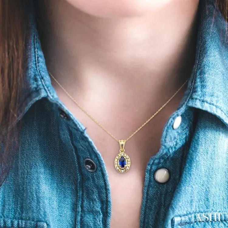 5x3mm Oval Shape Sapphire and 1/20 Ctw Single Cut Diamond Pendant in 10K Yellow Gold with Chain