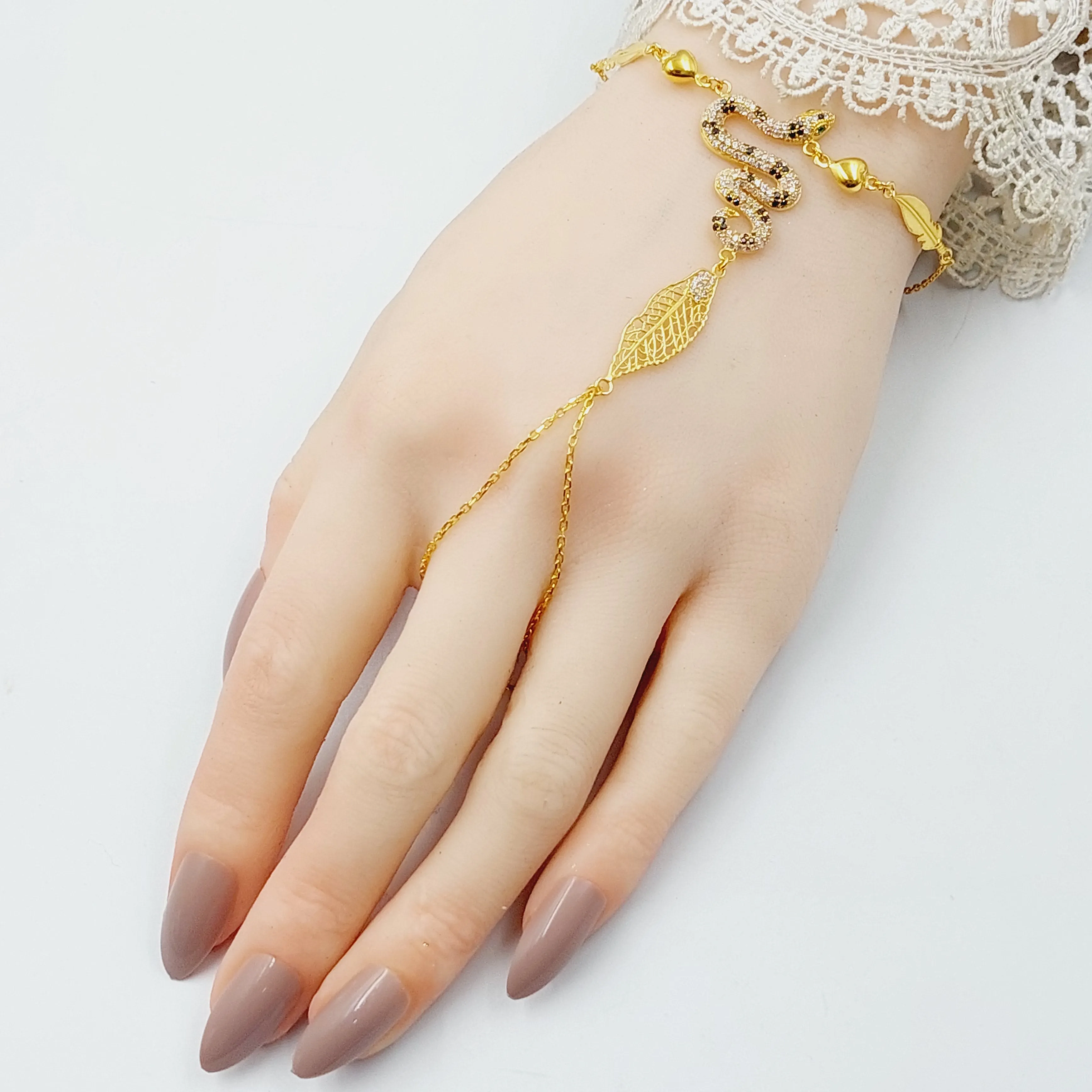 Zircon Studded Snake Hand Bracelet