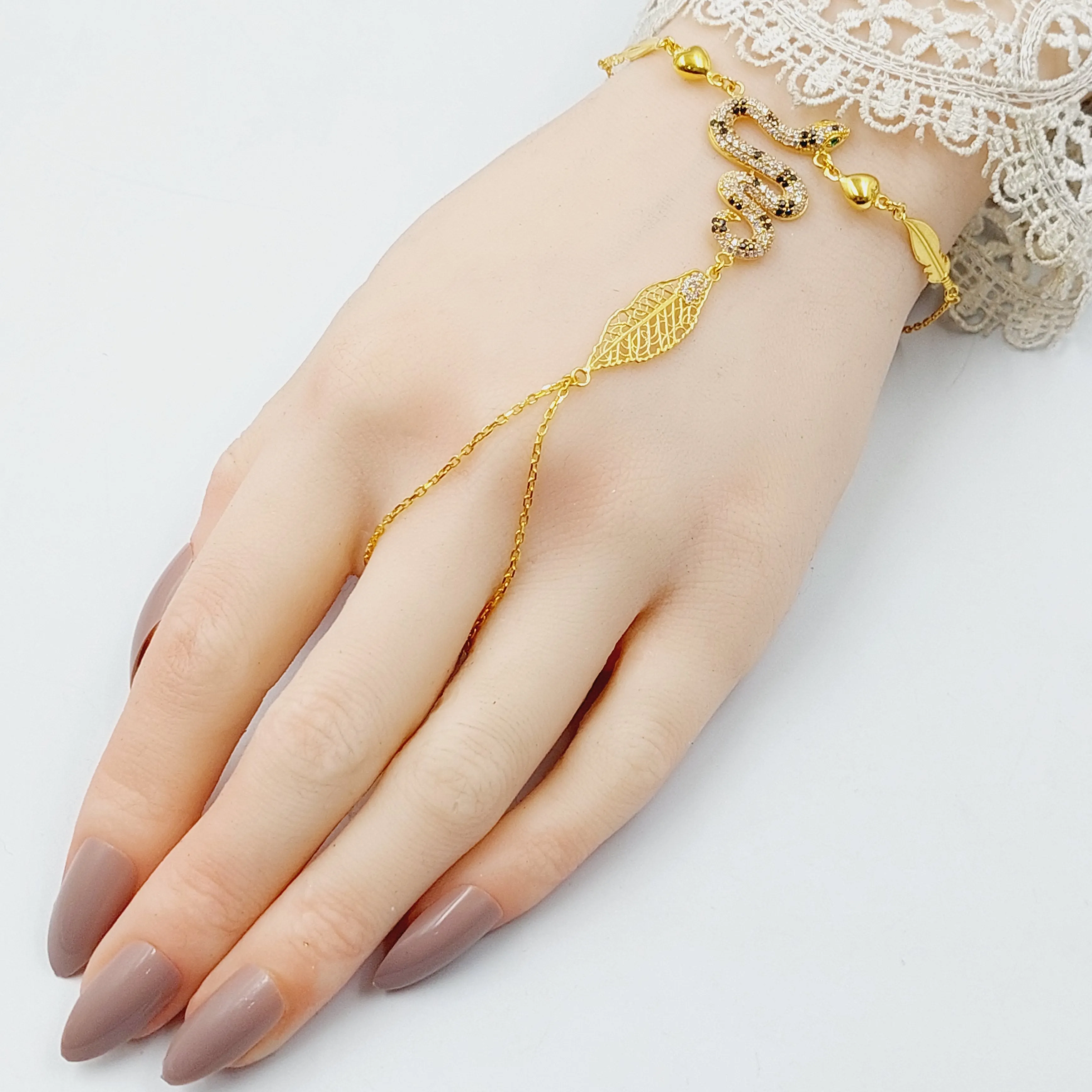 Zircon Studded Snake Hand Bracelet